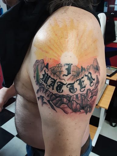 Tattoo Shop «Art In Motion Inc Tattooing», reviews and photos, 415 S Broadway St, Medina, OH 44256, USA