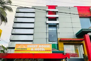 Jayawardhana Sweet House & Hotel image