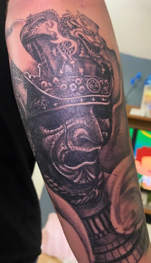 Find harley quinn and poison ivy tattoo ideas for your next unique tattoo in Largo at Alchemy Tattoos and Body Piercings