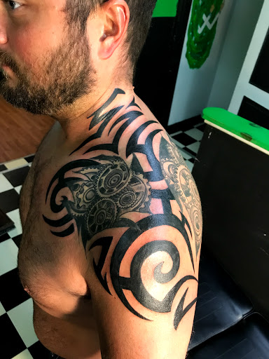 Explore fishing tattoo ideas for females, creative tattoo ideas in Hamilton, available at Glass Ink Tattoo