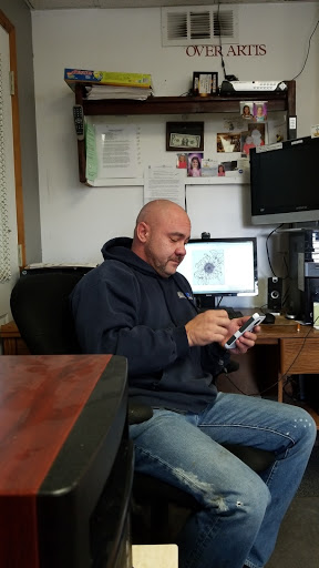 Explore purple rose tattoo ideas, creative tattoo ideas in Rockford, available at Reigning Ink Tattoo Emporium