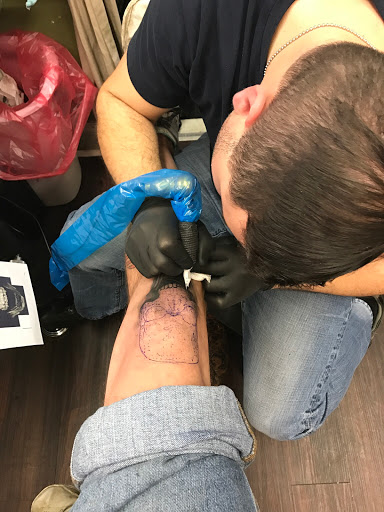 Explore chest tattoo filler ideas, creative tattoo ideas in Wilmington, available at Trademark Tattoo