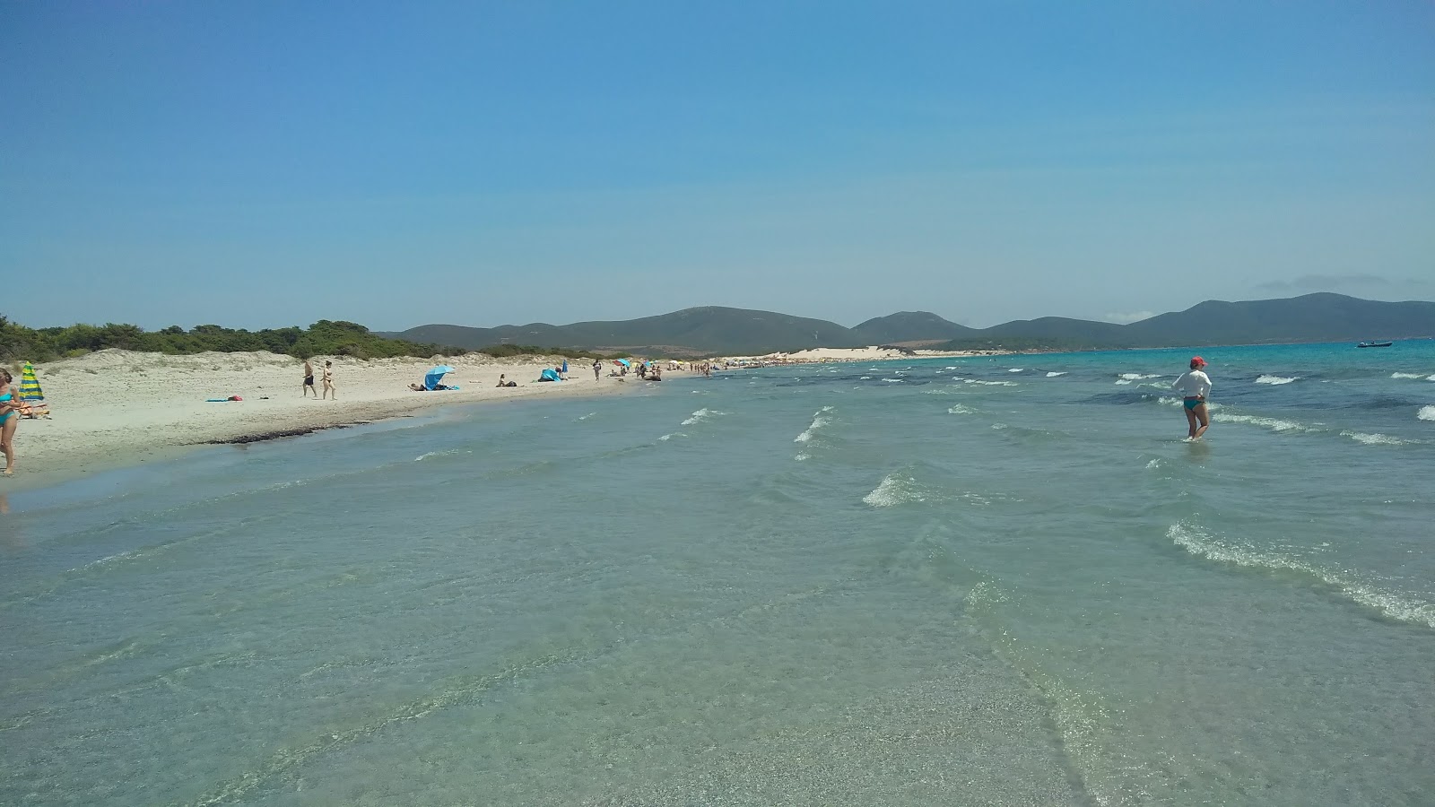 Photo of Porto Pino Beach located in natural area