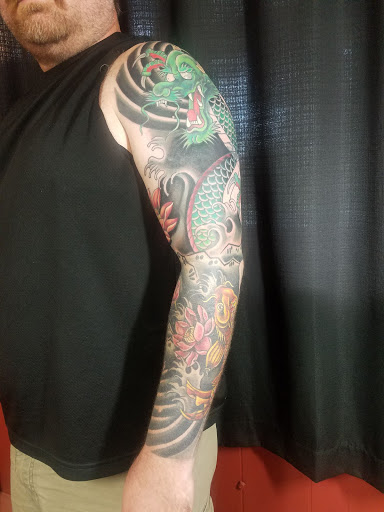 Explore tombstone tattoo ideas, creative tattoo ideas in Knoxville, available at American Tattoo Studio