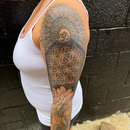 Explore black heart heart tattoo cover up ideas, creative tattoo ideas in Buffalo, available at True Gloom Tattoo Studio