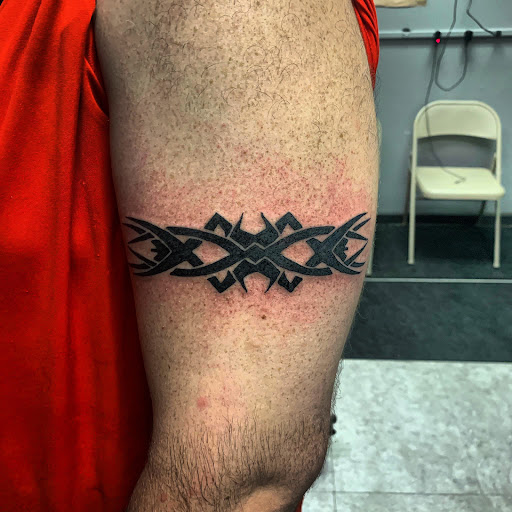 Explore tattoos xoxo ideas, creative tattoo ideas in Hudson Falls, available at ALTERED ADDICTION TATTOOS