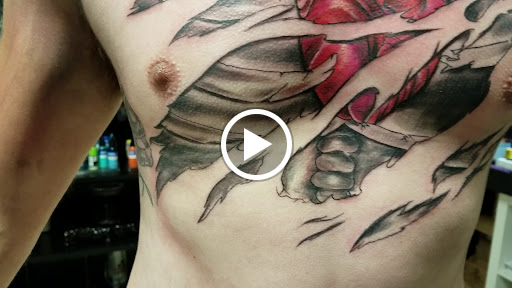 Explore forearm dragon tattoo ideas, creative tattoo ideas in Bowling Green, available at The Mad Tatter, L.L.C.