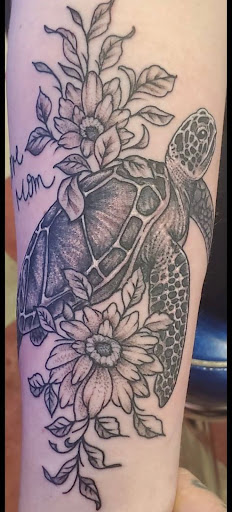 Explore simple neck tattoo ideas, creative tattoo ideas in Mchenry, available at Lunchbox Tattoo and Body Piercing