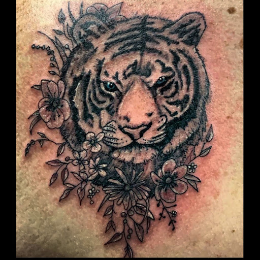 Explore unique water tattoo ideas, creative tattoo ideas in Hudson Falls, available at ALTERED ADDICTION TATTOOS