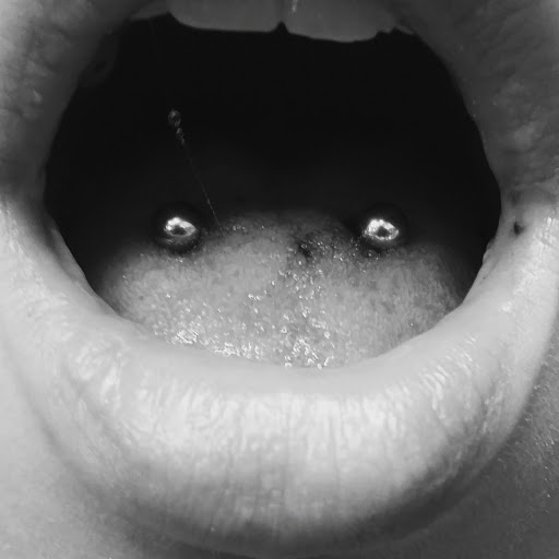 Explore boxer dog tattoo ideas, creative tattoo ideas in Albuquerque, available at Staceys Exotic Body Piercing and Tattoo