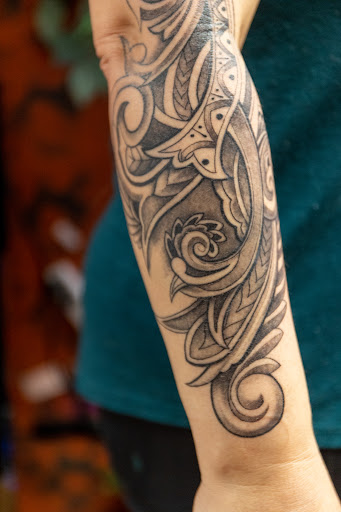 Explore marathon running tattoo ideas, creative tattoo ideas in Des Moines, available at Skin Kitchen Tattoo