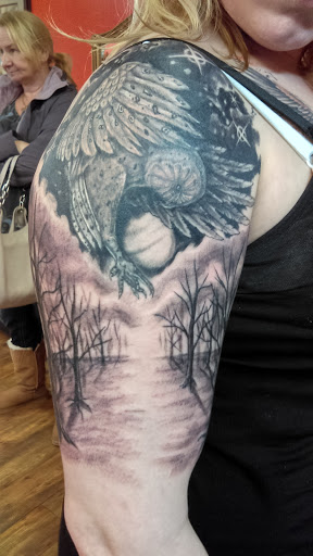 Explore forearm wolf tattoo ideas, creative tattoo ideas in Warren, available at Fat Cats Tattoos