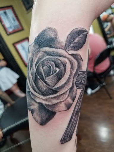 Explore thigh tattoo cover up ideas, creative tattoo ideas in Ottawa, available at Purple Rose Tattoos & Piercings