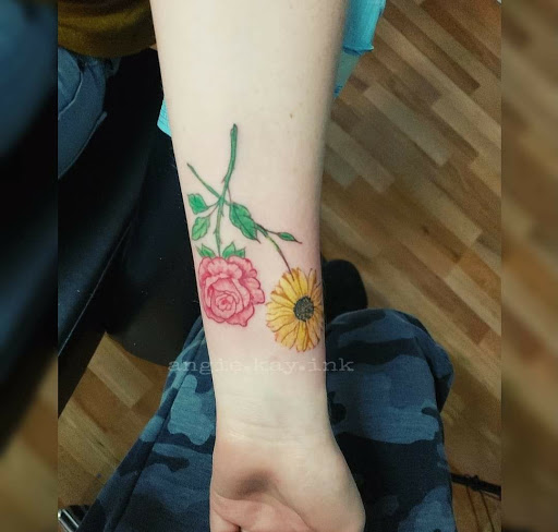 Explore baby footprint tattoo ideas, creative tattoo ideas in Casper, available at Luna & Lotus Amethyst Ink Angie Kay