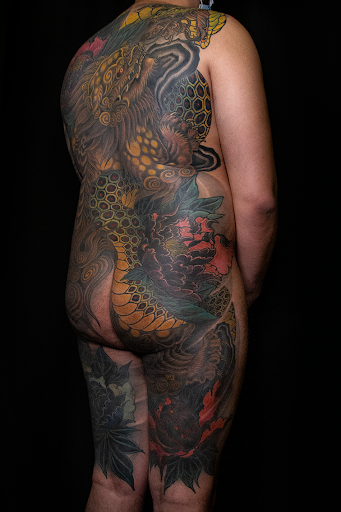 Explore racoon tattoo ideas, creative tattoo ideas in Brooklyn, available at Nine Dragons Tattoo