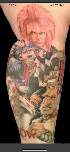 Explore above the knee tattoo ideas, creative tattoo ideas in Bemidji, available at Your Moms Tattoo Atelier, LLC