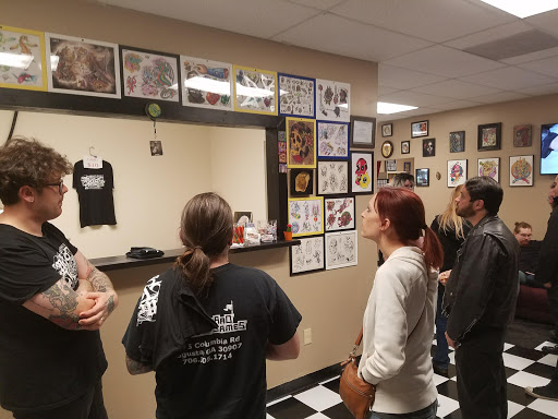 Explore calf tattoo ideas for men, creative tattoo ideas in Augusta, available at Mr. Tattoo