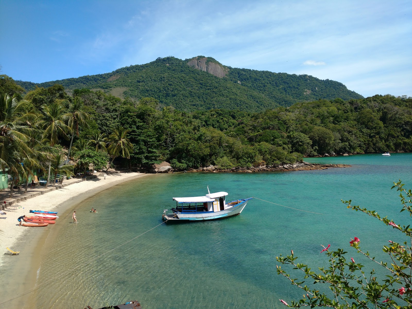 Photo of Praia Dos Macacos with bright fine sand surface