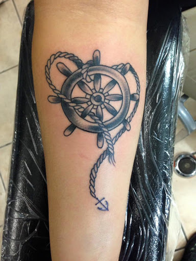 Tattoo Shop «Attitudes Muskegon», reviews and photos, 1610 Evanston Ave, Muskegon, MI 49442, USA