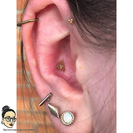 Explore tattoo ideas for a son, creative tattoo ideas in Oshkosh, available at Piercings by Paige at Big Guns Tattoo