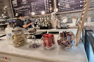 White Forest Cafe مقهى الغابة البيضاء image