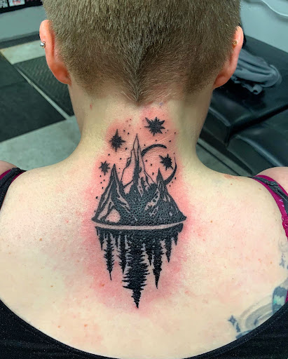 Explore arm cross tattoo ideas, creative tattoo ideas in Hudson Falls, available at ALTERED ADDICTION TATTOOS