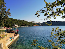 Uvala Scott beach II'in fotoğrafı düz bir kıyı şeridi ile birlikte