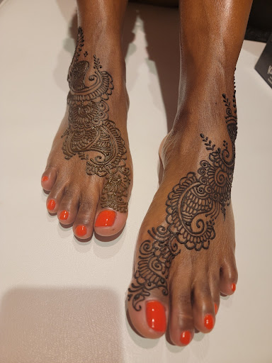 Explore sunflower thigh tattoo ideas, creative tattoo ideas in Vienna, available at Perfect Henna Tattoo by Kavita