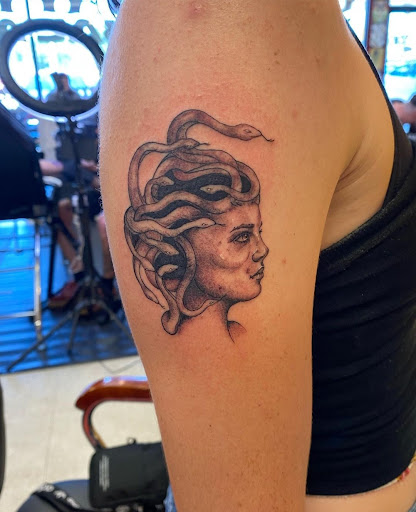 Explore only the strong survive tattoo ideas, creative tattoo ideas in Ambler, available at Tattoo GalaxyAmbler Piercing & Custom Tattoos