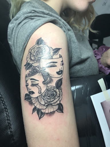 Explore tattoo ideas for dark skin guys, creative tattoo ideas in Fayetteville, available at Inkd Out Tattoos & Piercings