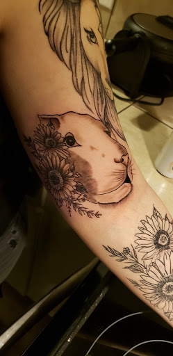 Explore tattoo ideas side, creative tattoo ideas in Bessemer City, available at Twisted Ink