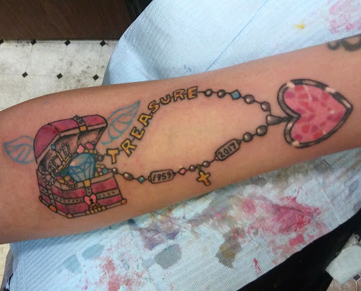 Explore collarbone tattoo ideas, creative tattoo ideas in Detroit, available at Swagg Shop (tattoos and piercings)