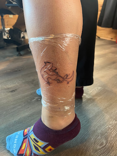 Explore christmas tree tattoo ideas, creative tattoo ideas in Randolph, available at Ink & Iron Tattoo LTD
