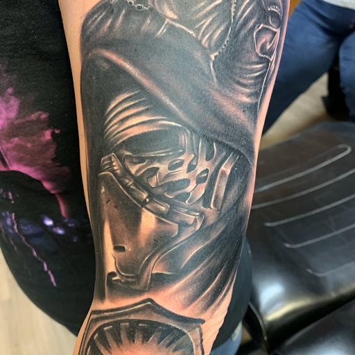 Explore cover up tattoo ideas for names on wrist, creative tattoo ideas in Kenosha, available at Kenosha Tattoo Company