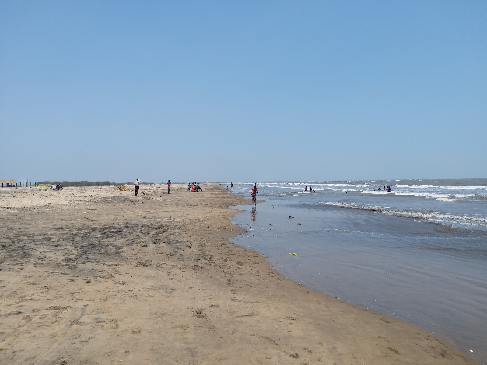 Dindi Beach的照片 带有灰沙表面