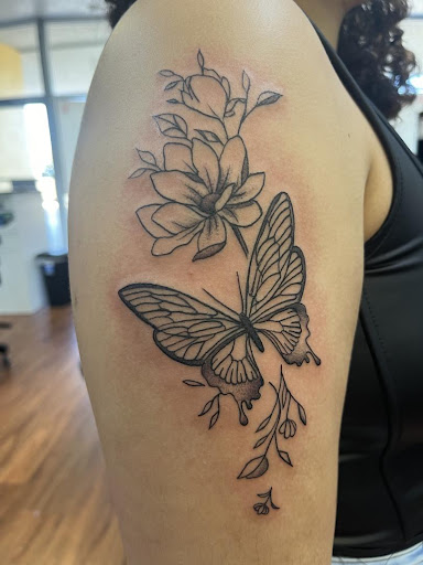 Explore tattoo on bicep ideas, creative tattoo ideas in Cocoa, available at Rorschach Tattoo Shop and Piercing Studio