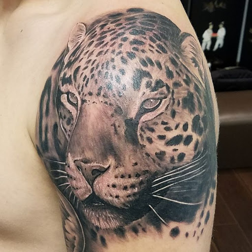 Tattoo Shop «OG Tattoos & Gallery», reviews and photos, 12211 Regency Village Dr #6b, Orlando, FL 32821, USA