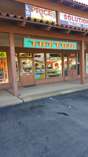 Explore scream tattoo ideas, creative tattoo ideas in Orange, available at Black Palm Tattoo