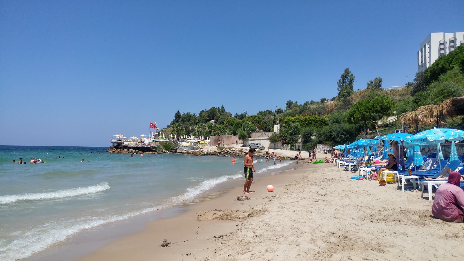 Foto de Playa del Café Paraíso y el asentamiento