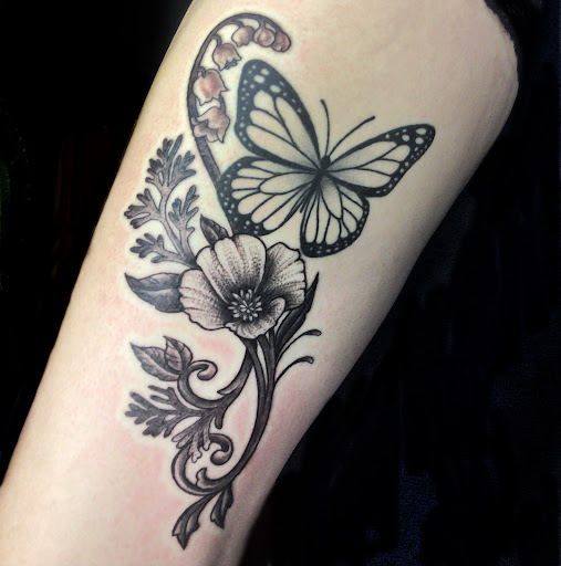 Explore tattoo ideas and designs for men, creative tattoo ideas in Topeka, available at Looking Glass Tattoo & Gallery