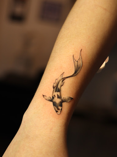 Explore baby boy tattoo ideas, creative tattoo ideas in Montgomery, available at Flying Eye Tattoo Studio