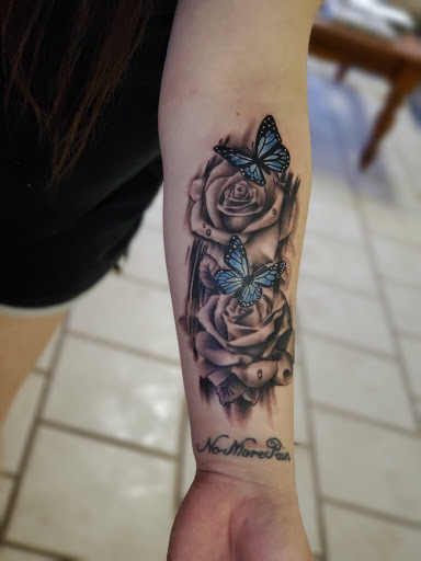 Explore cosmic tattoo ideas, creative tattoo ideas in Stamford, available at KE Tattoo Studio