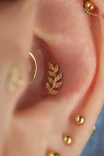 Explore super mario tattoo ideas, creative tattoo ideas in Buffalo, available at Moria Piercing and Jewelry