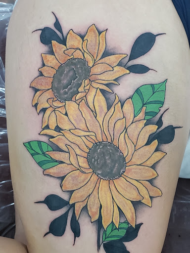 Find feminine skull tattoo ideas for your next unique tattoo in Cedar Springs at Americas Renegade Tattoo Society