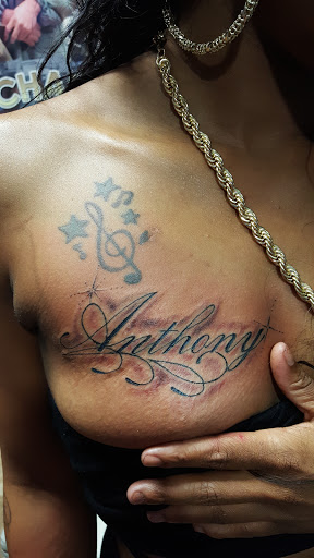 Find low back tattoo ideas for your next unique tattoo in Los Angeles at South Central Tattoos