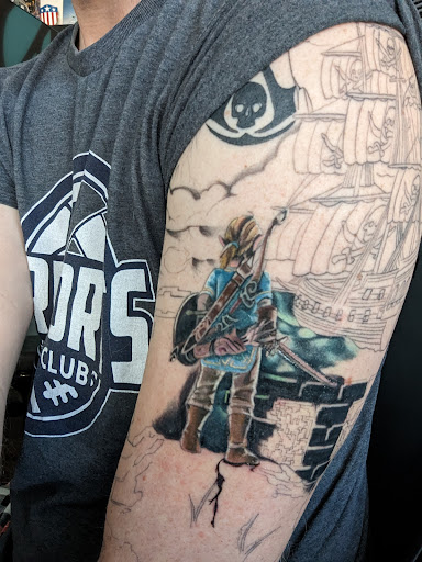 Explore ladies arm tattoo ideas, creative tattoo ideas in Chapel Hill, available at Golden Falcon Tattoo and Piercing