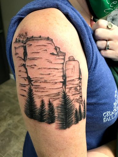 Explore tattoo tribal sleeve ideas, creative tattoo ideas in Jackson, available at Asylum Tattoo