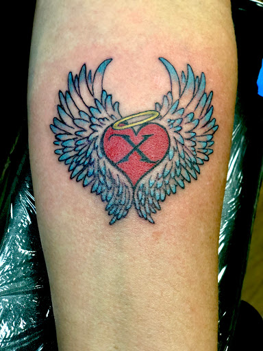 Explore father and son tattoos ideas, creative tattoo ideas in Amarillo, available at Tattoo Spa LLC