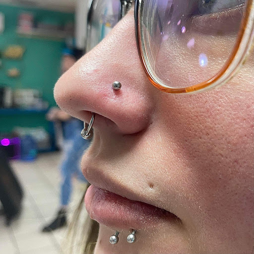Explore mom tattoo ideas for men, creative tattoo ideas in Nampa, available at Hippie Hoops and Holes