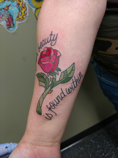 Explore armband tattoo ideas for men, creative tattoo ideas in Lincoln, available at Iron Brush Tattoo